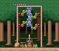 une photo d'Ã©cran de Puzzle Bobble - Bust a Move sur Nintendo Super Nes